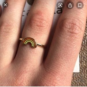 Three gold rainbow rings